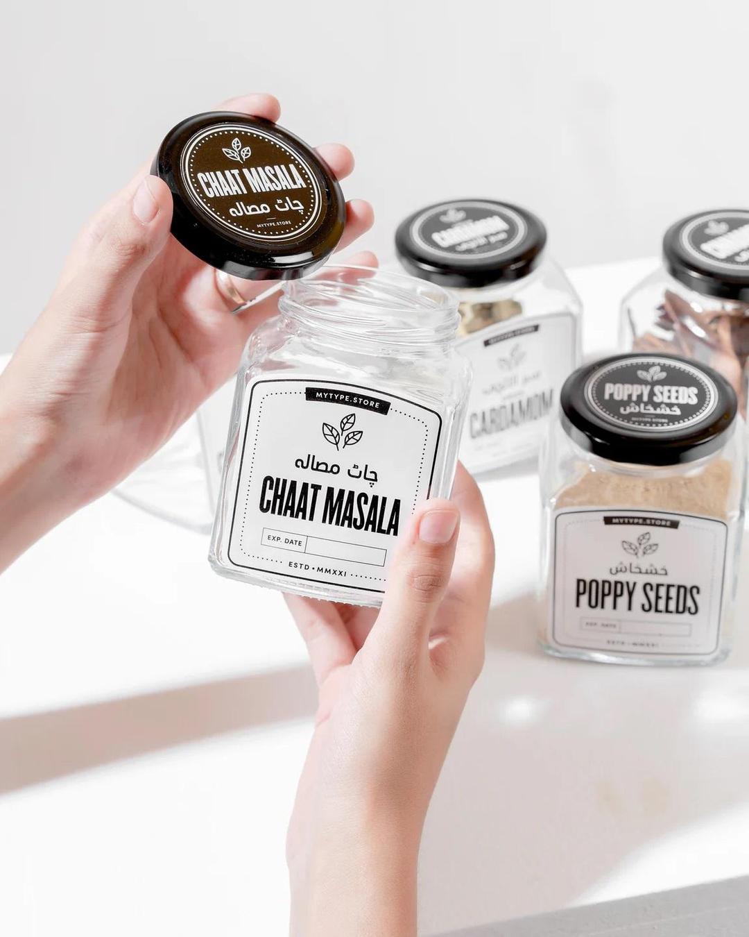 Stylish 8 Pcs Spices Jar Set - Enhance Your Kitchen Functionality.