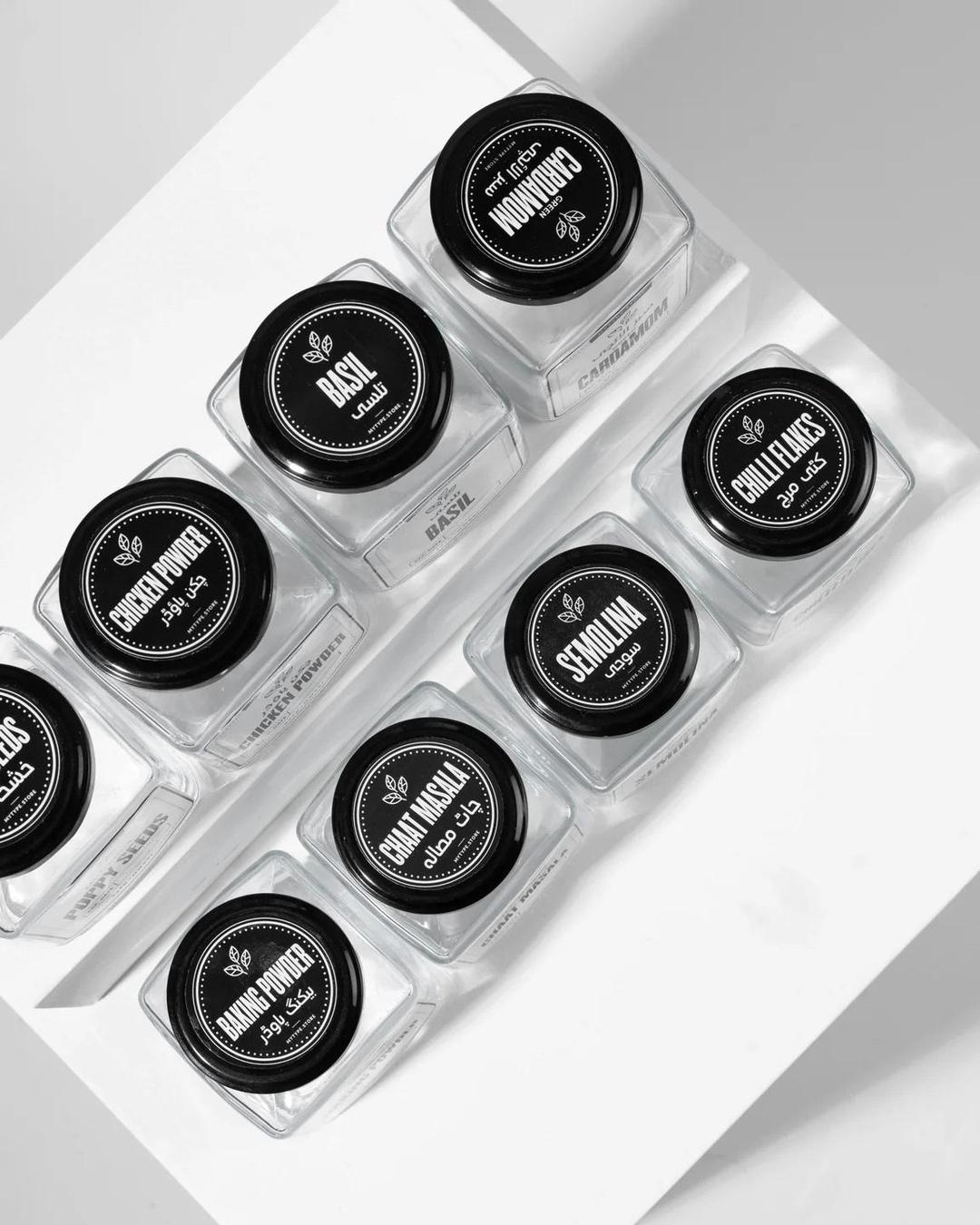 Stylish 8 Pcs Spices Jar Set - Enhance Your Kitchen Functionality.